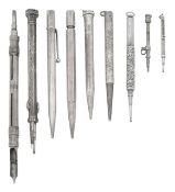 A group of nine silver propelling pencils