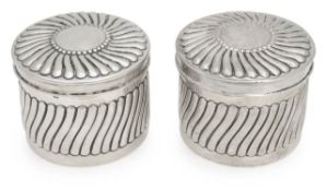 A pair of Victorian silver canisters