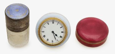 A silver and guilloche enamel box, jar, and desk clock