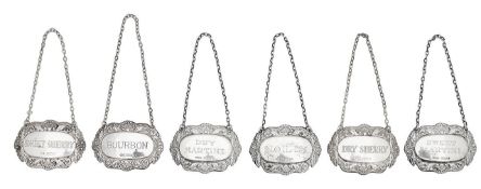 Six Elizabeth II silver decanter labels