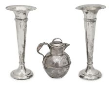 Two Edward VII silver trumpet vases, and a George V lidded milk jug