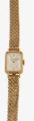 An 18K gold Cortebert lady's wristwatch with a 9ct gold strap