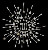 A large collection of George III and later silver cruet spoons,