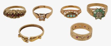 A collection of four 70's rings and two more