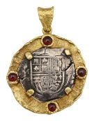 A Weiland garnet pendant mounted with late 16th/early 17th century Spanish silver four Reales cob