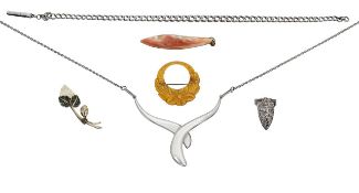 A silver curb chain with pen knife charm and four more