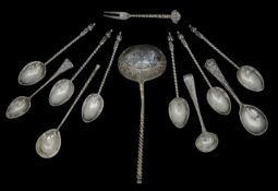 A collection of silver spoons