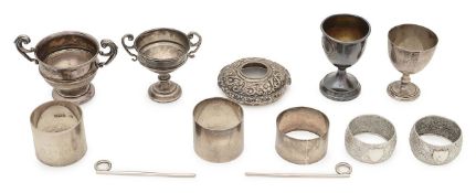 A collection of silver cruet items