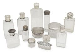 A group of silver mounted cut glass dressing table jars