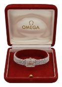 A ladies Omega diamond 18K wristwatch