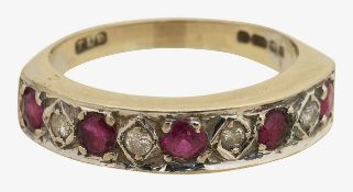 An 18ct ruby and diamond half eternity ring
