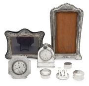 A collection of silver desk items