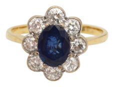 A sapphire and diamond cluster ring