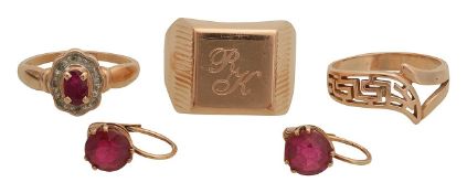 A diamond and ruby cluster ring and drop ear rings