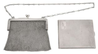 A silver mesh purse and cigarette case