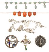 A silver charm bracelet, two necklaces, brooches and pendant