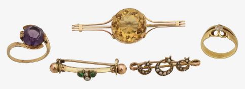A diamond gypsy ring, three brooches and one more