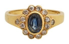 An 18ct sapphire and diamond cluster ring