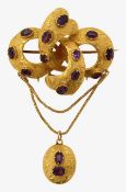 An early Victorian gold and amethyst knot brooch