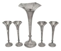 A set of four Edward VII silver bud and a larger trumpet vase