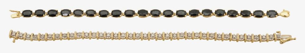 A diamond line bracelet and sapphire line bracelet