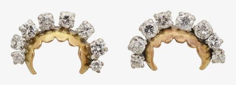 A pair of diamond crescent ear rings