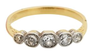 A diamond five stone ring