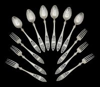 A set of silver filigree forks and spoons