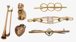 A collection of pins and charms