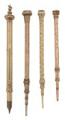 A group of four 9ct gold propelling pencils