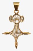 A Continental filigree pendant in the form of a cross