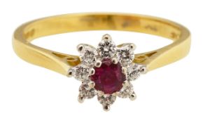 An 18ct ruby and diamond cluster ring