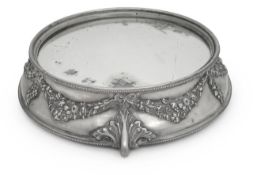 A silver plated and mirrored cake stand