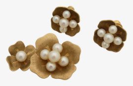 A set of pearl ear clips with matching brooch
