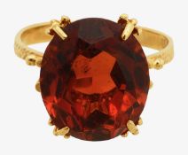 An orange grossular garnet dress ring