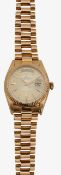 An 1803 18ct gold Rolex Oyster Perpetual day date wristwatch