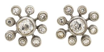 A pair of diamond-set ear studs