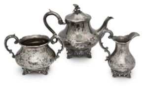 A composed Victorian silver three piece tea service