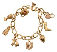 A 9ct curb chain charm bracelet