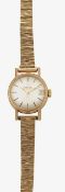 A lady's Omega Autiomatic 9 carat yellow gold wristwatch