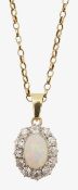 A opal and diamond cluster pendant
