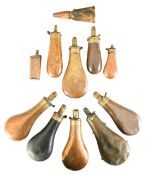 Thirteen Victorian brass, copper and horn powder and shot flasks