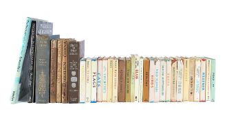 A collection of antique reference works and Observer Guides