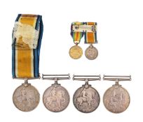 Four WWI British War medals and a miniature pair