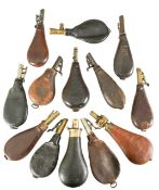 Fourteen Victorian leather powder and shot flasks