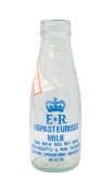 A Queen Elizabeth II glass Unpasteurised Milk bottle