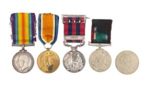 An India General Service Medal, a WWI medal pair, and a Women's Voluntary Service Medal