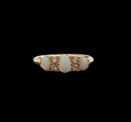 An Edwardian opal and diamond ring