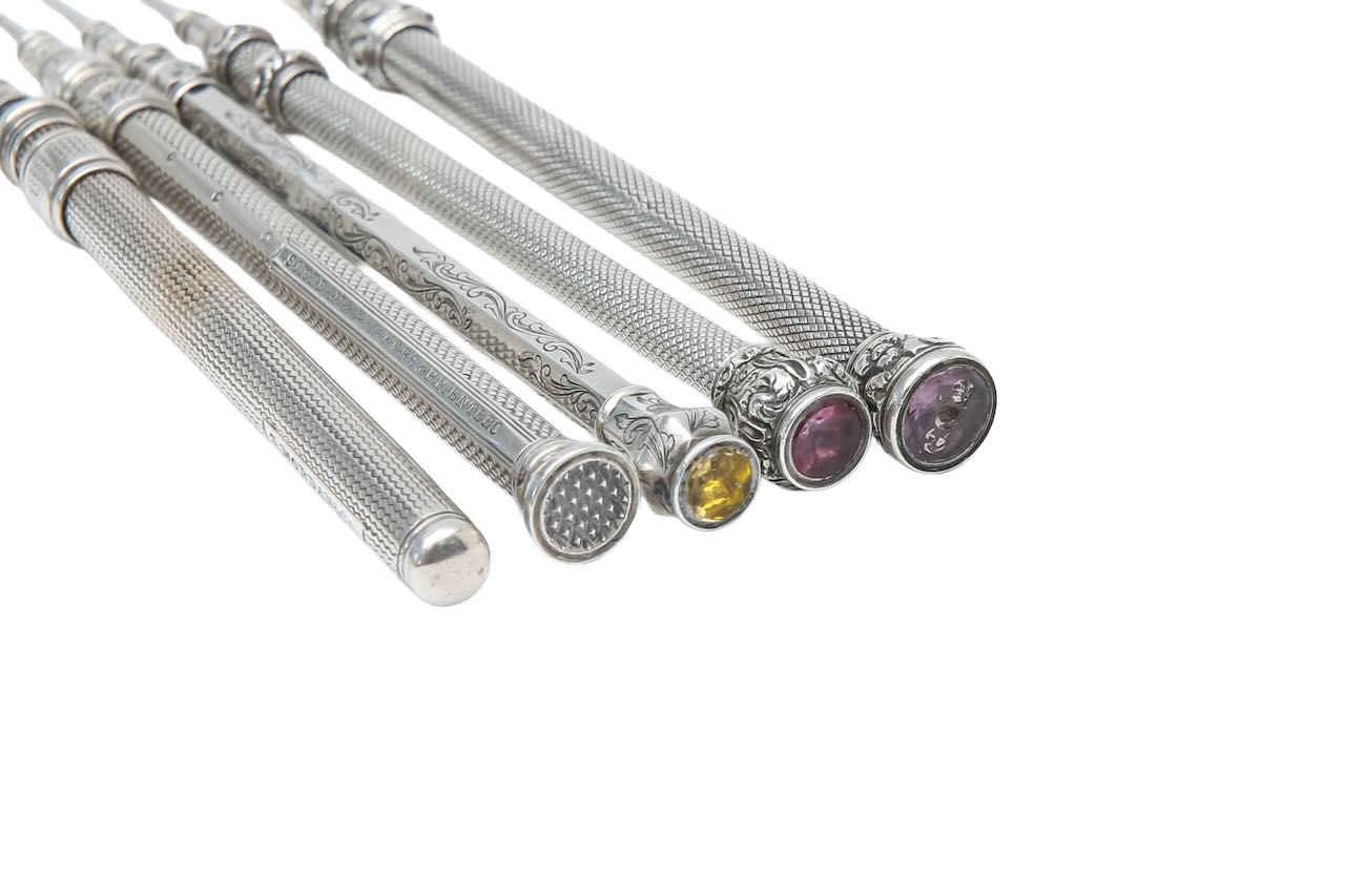 Five Sampson Mordan silver propelling pencils, a dwarf candlestick and a double sovereign holder - Image 2 of 2