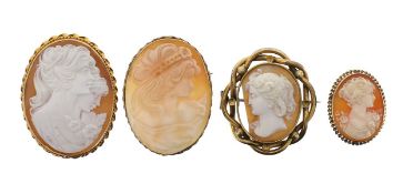 A collection of carved cameo shell brooches